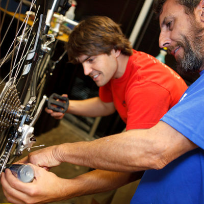 Mechanic teaching at Bicycle Sport Shop