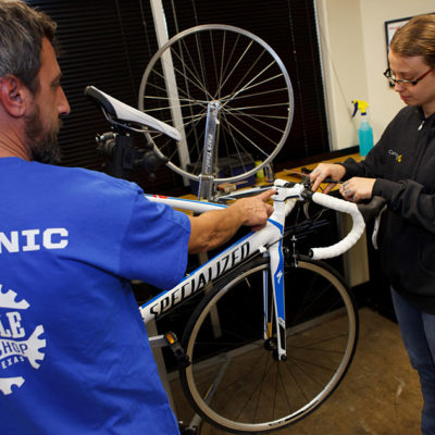 Mechanic teaching at Bicycle Sport Shop