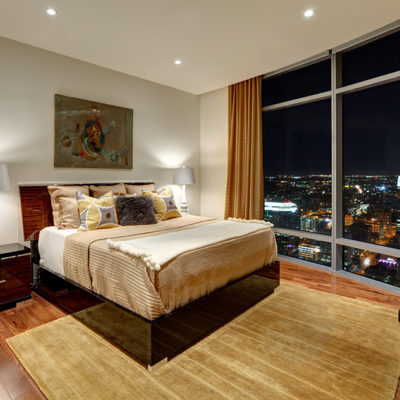 Photograph of a bedroom in the Austonian building.